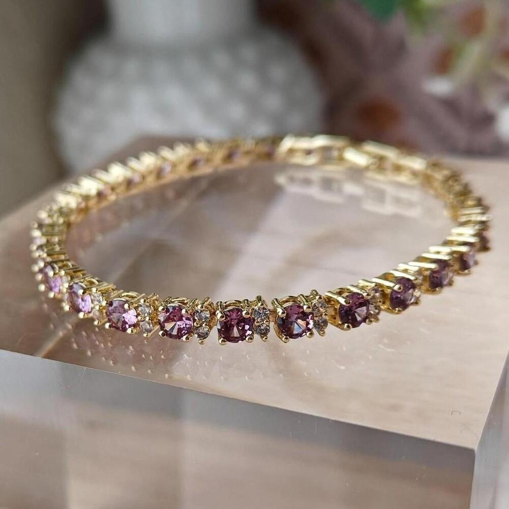 Dainty gold tone and purple crystal tennis bracelet